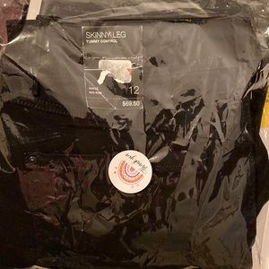 Deep black jeans by INC are skinny-leg, regular fit, size 12 with tummy control